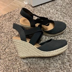 Black closed toe wedges. New, never worn